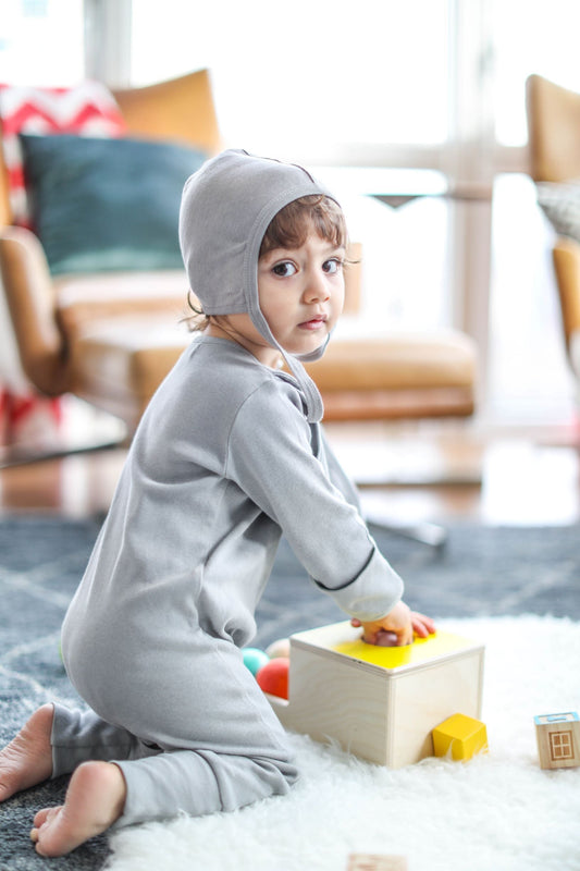 "Discover the Ultimate Convenience with Our Gray Smart-Footed One-Piece Bib - Perfect for Busy Parents!"