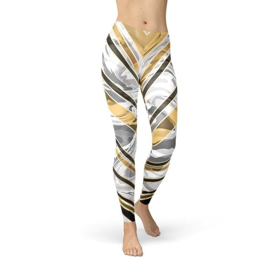 "Unleash Your Inner Goddess: The Story Behind Our Women's White Marble Leggings with Black and Gold Lines"