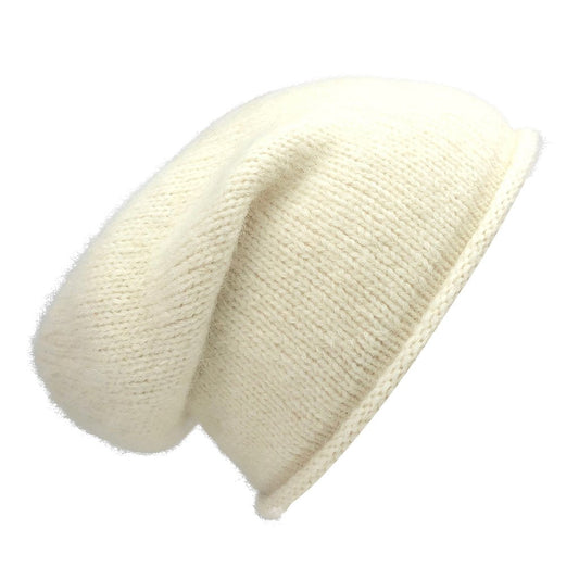 "Stay Cozy and Stylish with Our Snow Essential Knit Alpaca Beanie - The Perfect Winter Accessory!"
